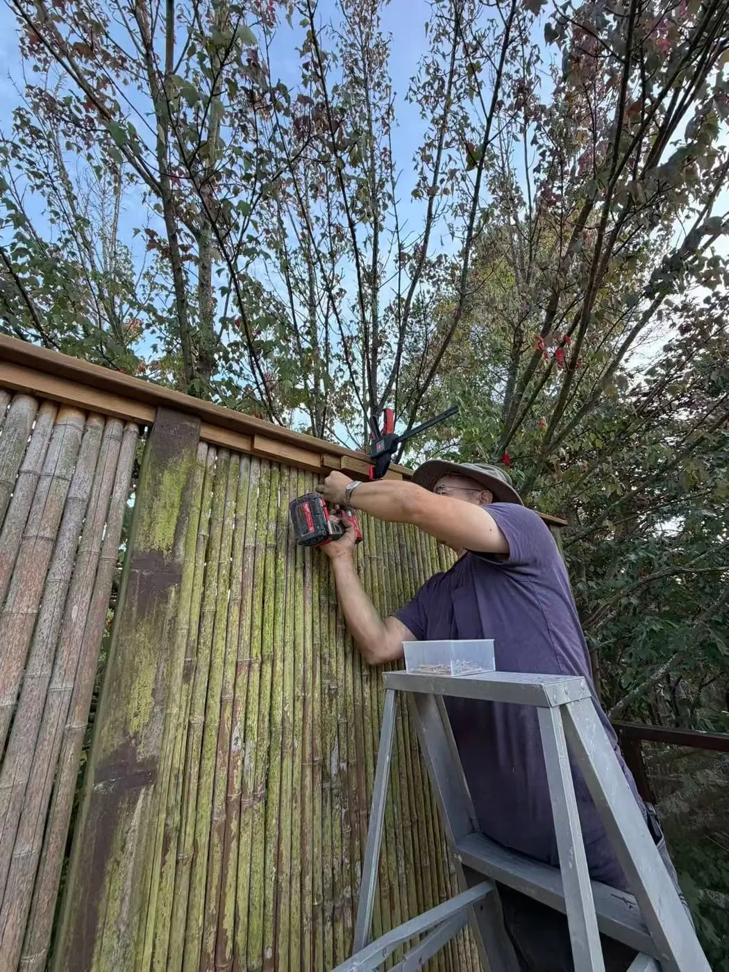 New top rail going on, holding the bamboo flat again.