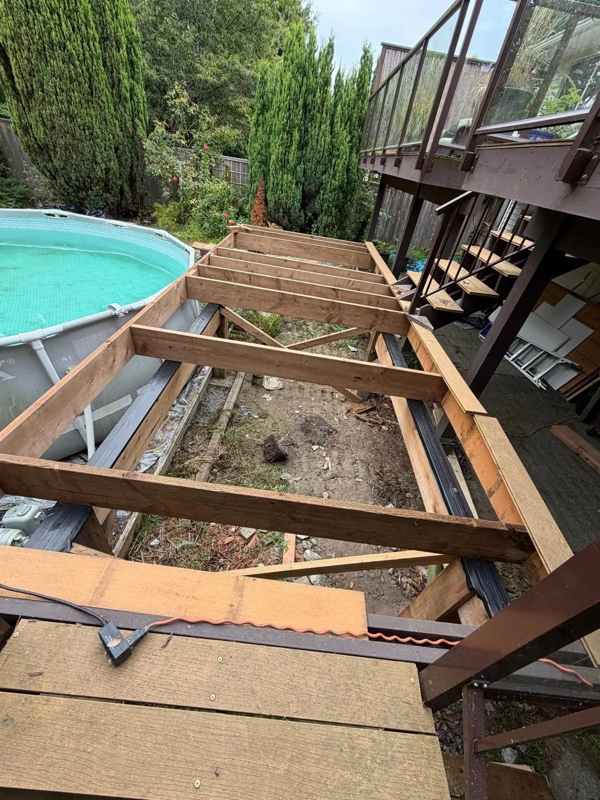 New framing laid out after the rotten deck surface was opened up.