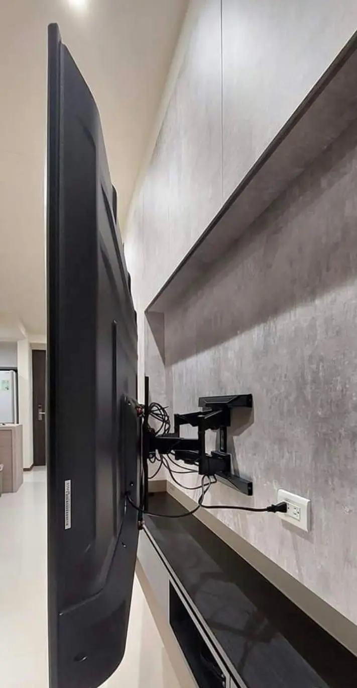 Cables dressed down to the outlet, nothing hanging.
